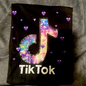 Black Tik Tok Tee’s size Medium